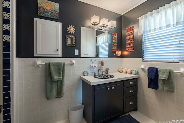 bathroom with vanity, tile walls, and decorative backsplash