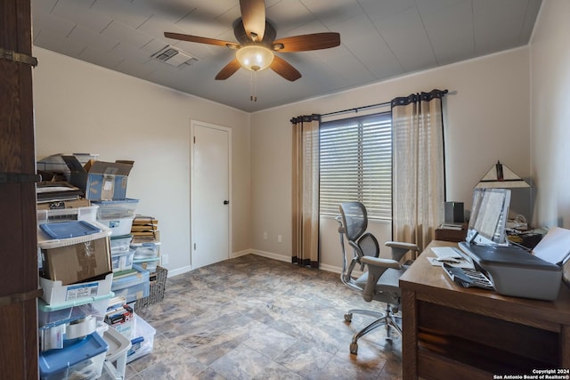 office area featuring ceiling fan, visible vents, and baseboards