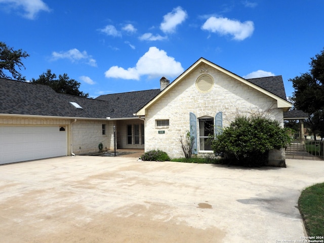 view of front of home with a garage