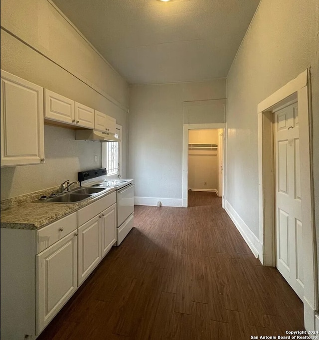 kitchen featuring dark hardwood / wood-style floors, white cabinets, sink, and white electric stove