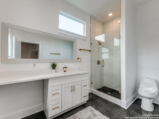 bathroom featuring tile patterned flooring, an enclosed shower, vanity, and toilet