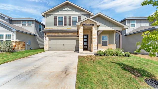 craftsman inspired home with a garage and a front lawn