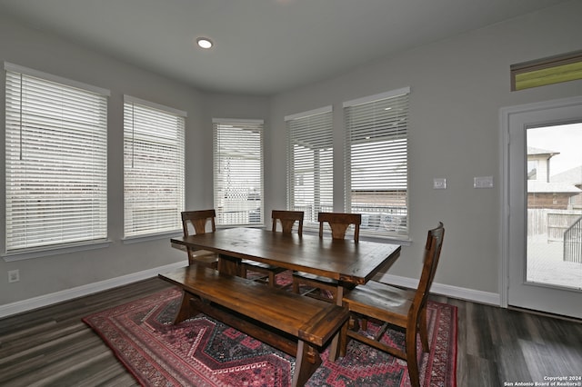 dining area with dark wood-type flooring