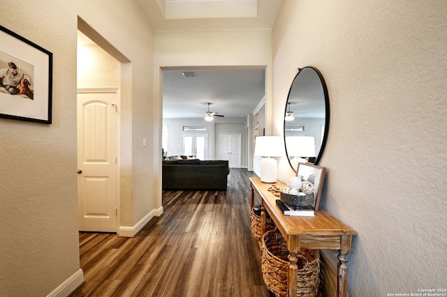 corridor featuring dark hardwood / wood-style floors