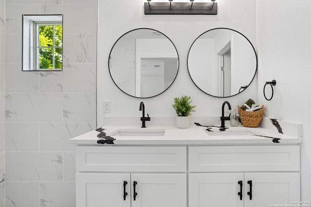 full bath featuring double vanity and a sink