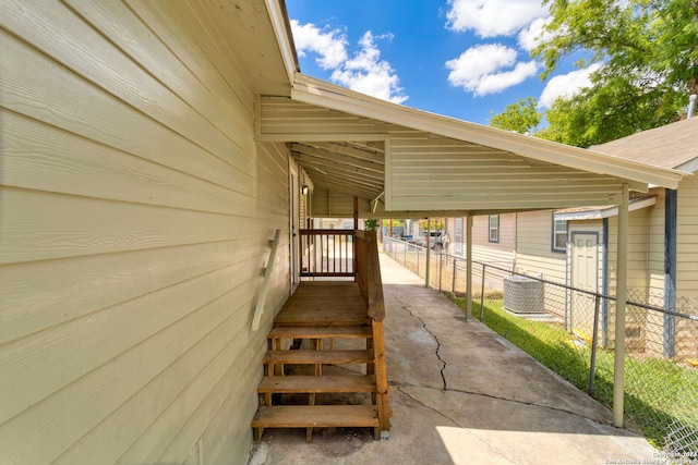 entrance to property with a carport