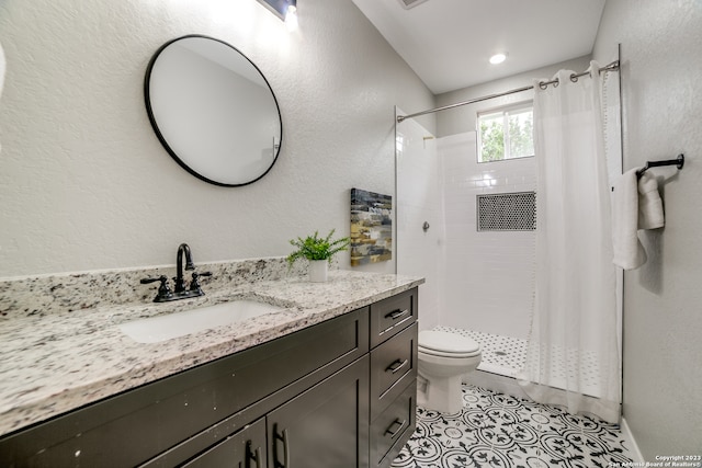 bathroom with a shower with shower curtain, tile patterned flooring, toilet, and vanity