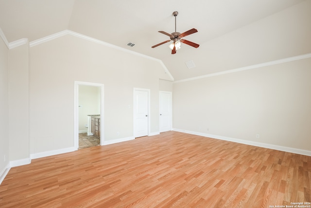 unfurnished room featuring light wood-type flooring, ceiling fan, high vaulted ceiling, and crown molding