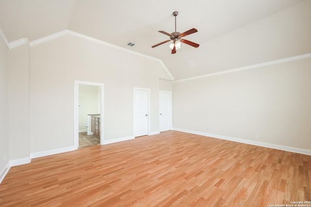 unfurnished bedroom featuring high vaulted ceiling, light wood-type flooring, baseboards, and ornamental molding