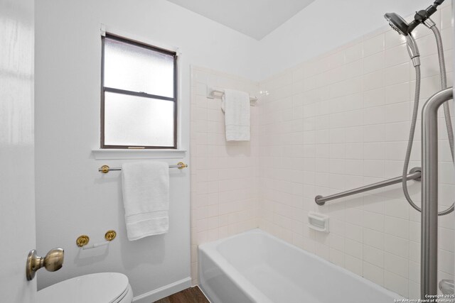 bathroom featuring independent shower and bath, hardwood / wood-style flooring, and vanity