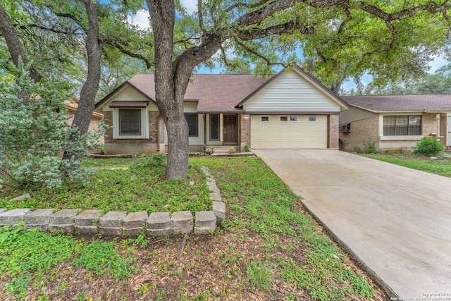 ranch-style home featuring a garage