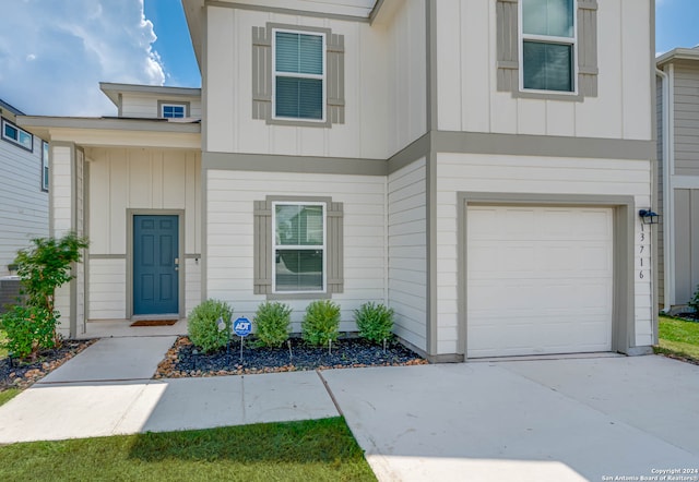 view of front of home with a garage