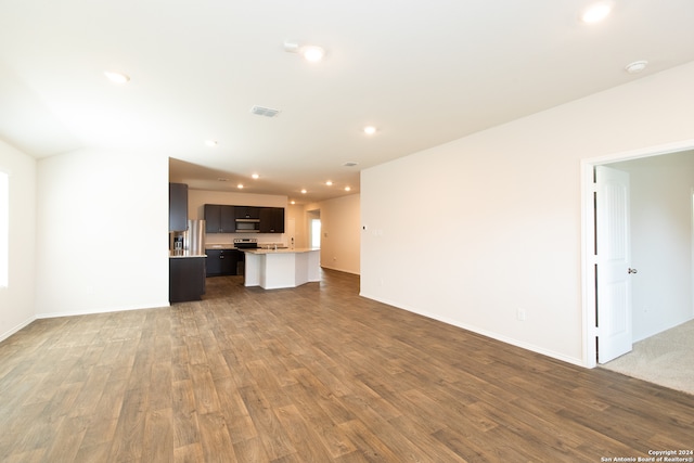 unfurnished living room featuring hardwood / wood-style floors