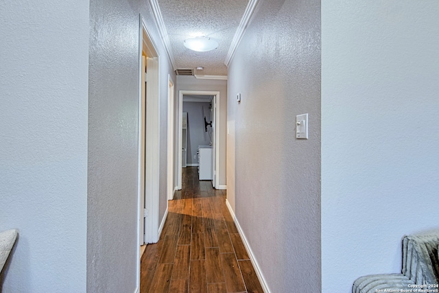 hall with dark hardwood / wood-style flooring and a textured ceiling