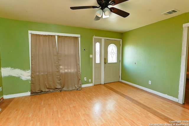 entryway with light hardwood / wood-style flooring and ceiling fan