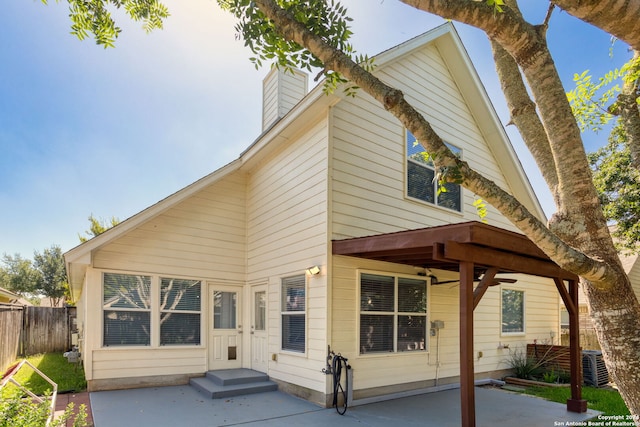 rear view of house featuring a patio