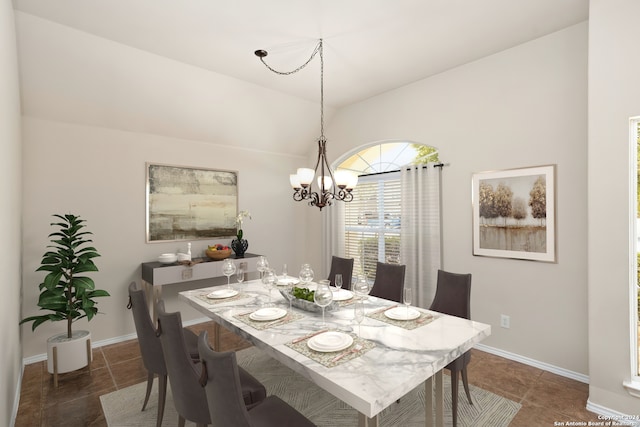 dining room featuring a notable chandelier