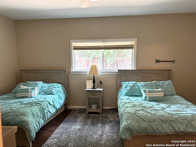 bedroom featuring dark hardwood / wood-style floors