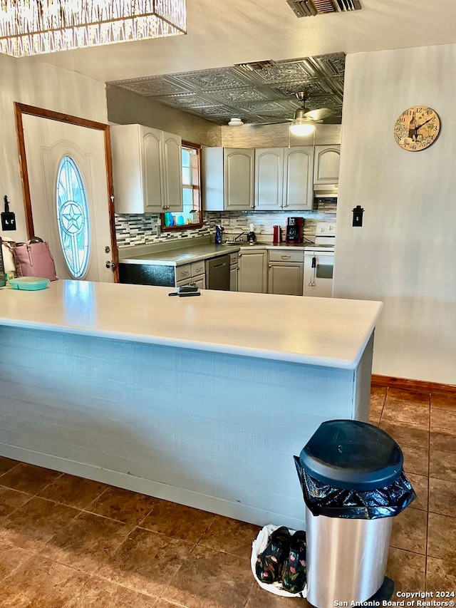 kitchen with dishwasher, white range with electric cooktop, and tasteful backsplash