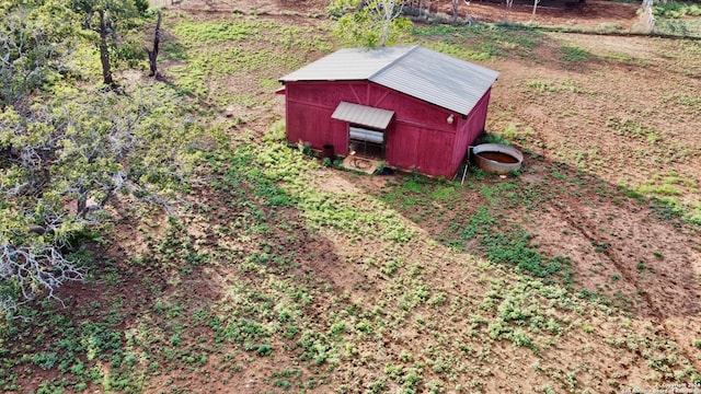 exterior space with a shed