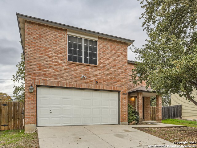 view of property with a garage