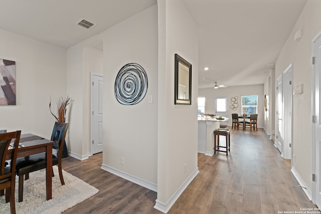 dining space featuring dark hardwood / wood-style floors