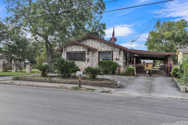 view of front facade with a carport