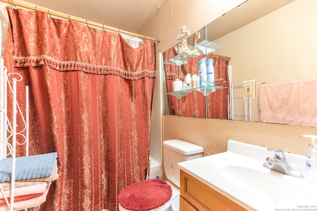 full bathroom with vanity, toilet, and shower / bath combo