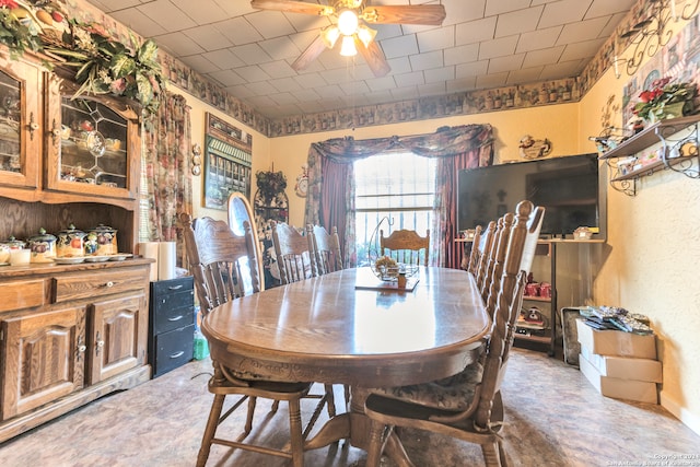 dining room featuring ceiling fan