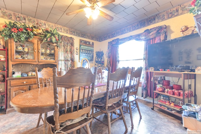 dining room featuring ceiling fan