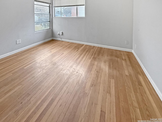 empty room featuring light hardwood / wood-style floors