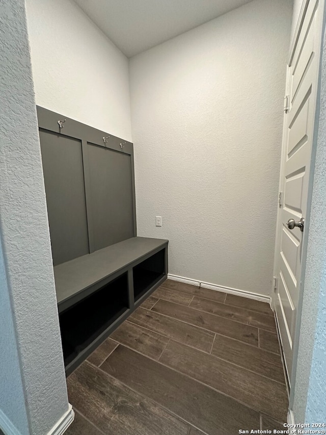 mudroom with dark hardwood / wood-style floors