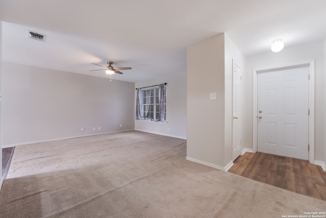 entrance foyer featuring hardwood / wood-style floors and ceiling fan