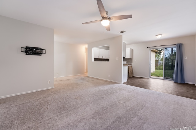 unfurnished room featuring light wood-type flooring and ceiling fan