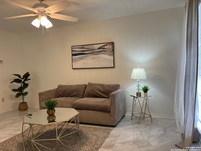 living room with ceiling fan