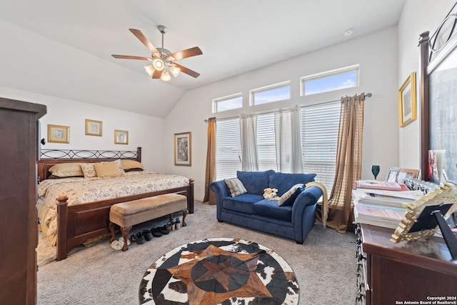 carpeted bedroom with lofted ceiling and ceiling fan