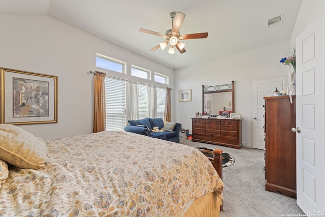 carpeted bedroom featuring lofted ceiling and ceiling fan