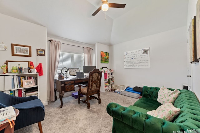 office area featuring ceiling fan, light colored carpet, and vaulted ceiling