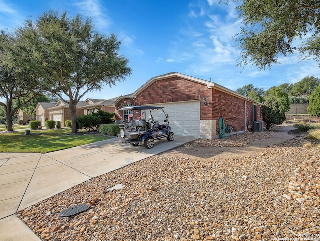 view of home's exterior with a yard, a garage, and central AC