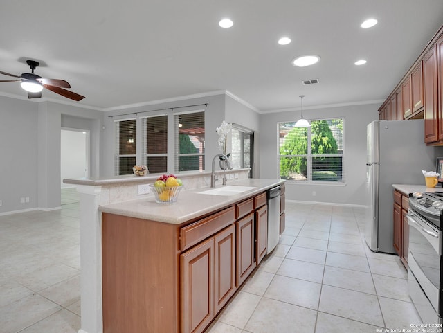 12526 Rapids Pass, San Antonio, TX 78253 - kitchen with a sink, stainless steel appliances, crown molding, baseboards, and light tile patterned floors