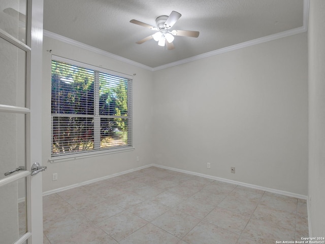 unfurnished room featuring a textured ceiling, crown molding, and ceiling fan