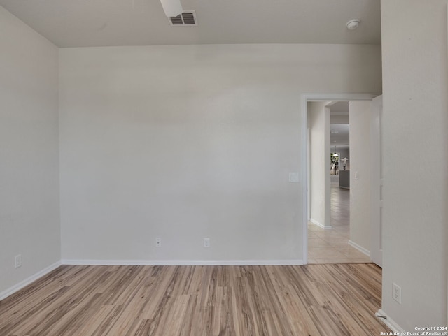 empty room with light wood-type flooring