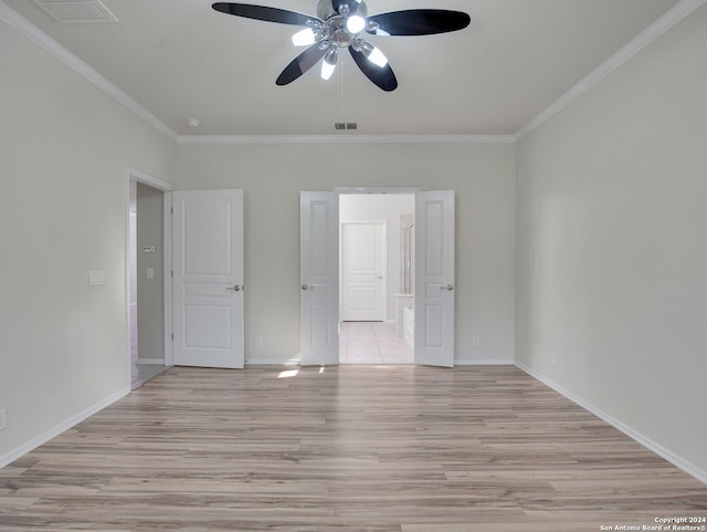 12526 Rapids Pass, San Antonio, TX 78253 - spare room featuring a ceiling fan, crown molding, light wood-type flooring, and baseboards
