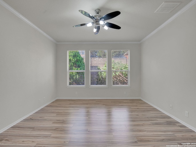 unfurnished room with crown molding, light hardwood / wood-style flooring, and ceiling fan