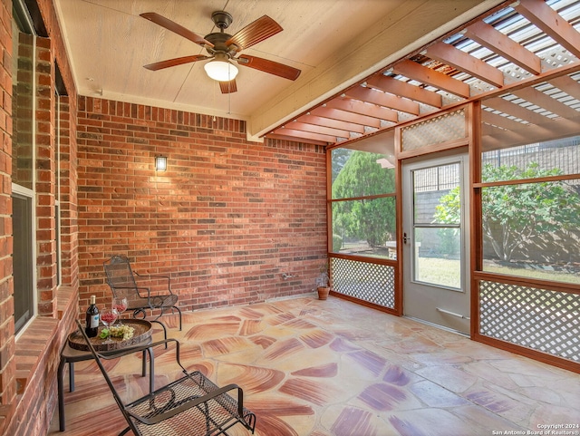 12526 Rapids Pass, San Antonio, TX 78253 - unfurnished sunroom featuring ceiling fan and beamed ceiling