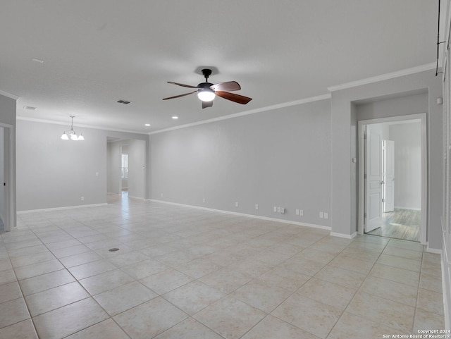 tiled spare room with ceiling fan with notable chandelier and crown molding