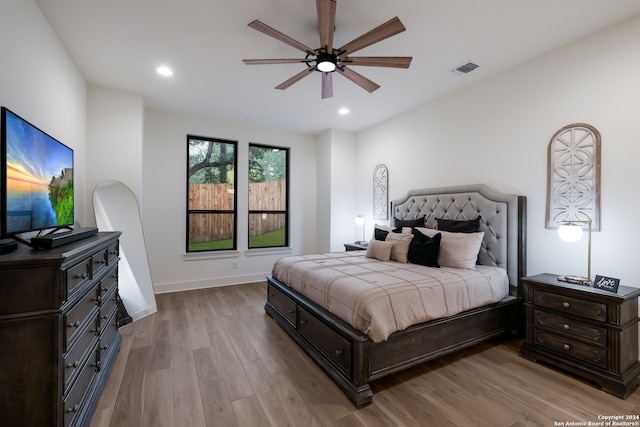 bedroom featuring ceiling fan and light wood-type flooring