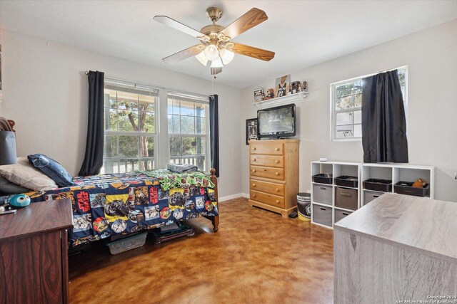 bedroom with ceiling fan and carpet floors