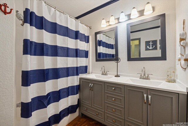 bathroom featuring vanity, a shower with curtain, and hardwood / wood-style floors