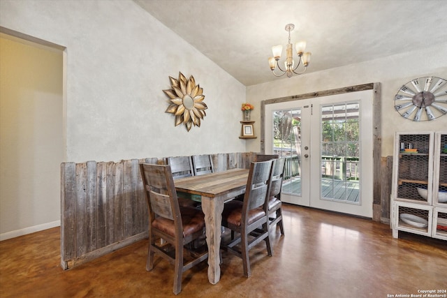 dining room featuring french doors and an inviting chandelier